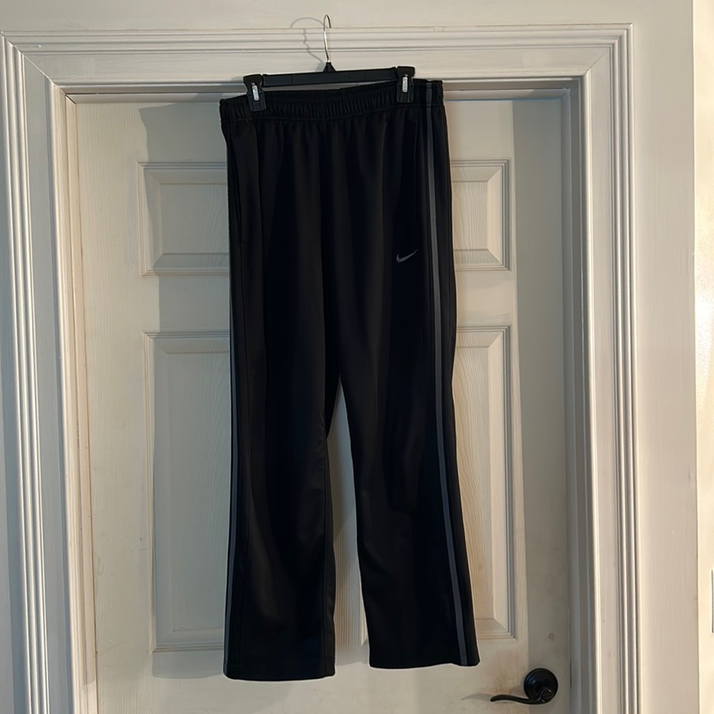 Black with gray stripe Nike sweatpants.  Medium.  Very good condition.